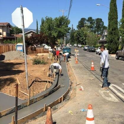 Concrete contractors resurfacing road in Richland County SC.