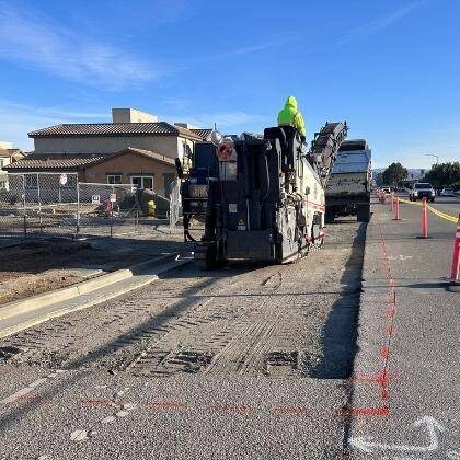 Sealcoating companies near me in Columbia, SC preparing a parking lot for sealcoating.