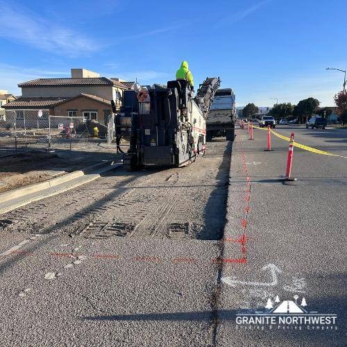 Milling parking lot before asphalt overlay in san jose, CA
