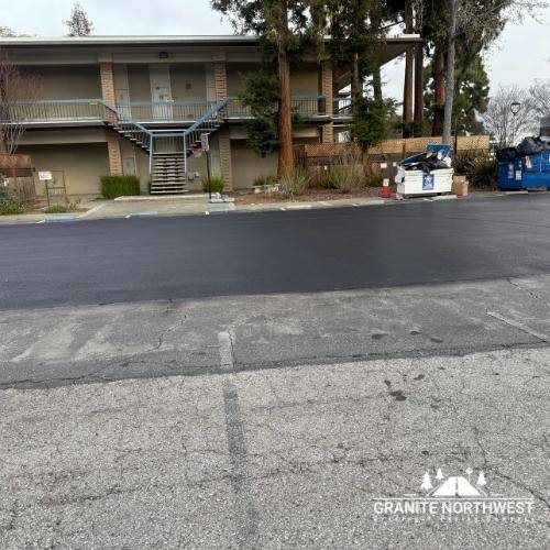Fresh Laid Asphalt Paving For A Parking Lot