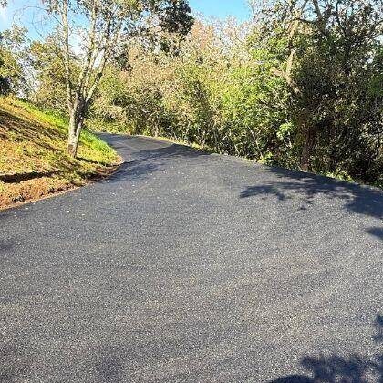 Private road repairs after completion by an asphalt contractor in the midlands area of sc.