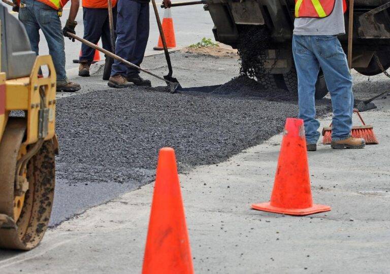 Customer happy he was able to save money with an asphalt driveway overlay in Columbia, SC