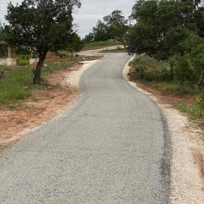 Chip Seal Paving Road In Columbia, SC.